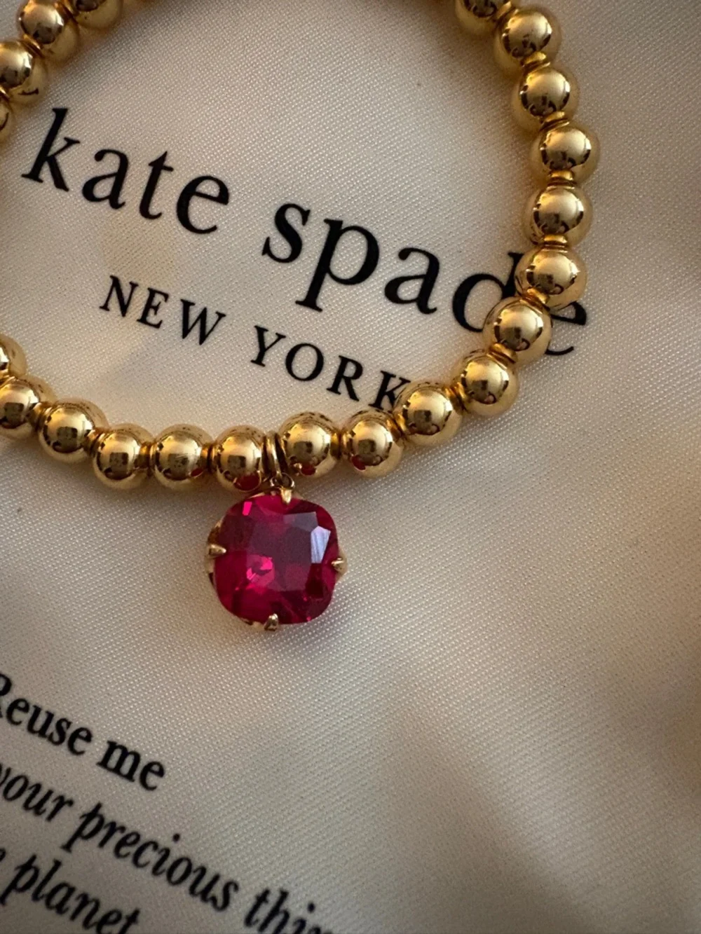 kate spade Gold Beaded Bracelet with Red Gem Charm - Picture 5 of 6